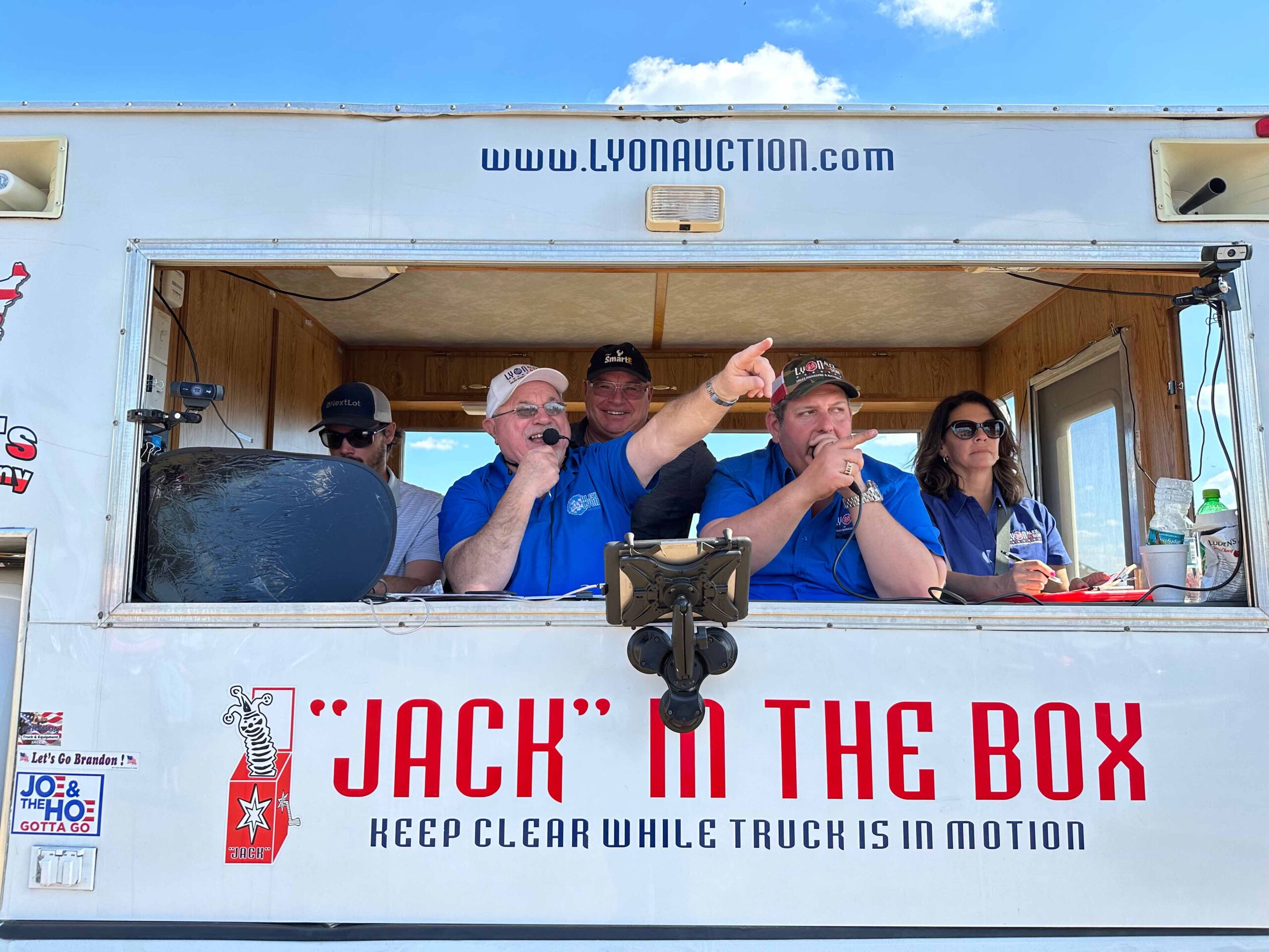 Auctioneer Jack Lyon in the Jack In The Box truck calling a sale